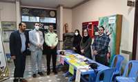 کارشناسان مرکز بهداشت  در جمع معلمان و مدیران مدارس شهرستان درگزین و برپایی غرفه سلامت